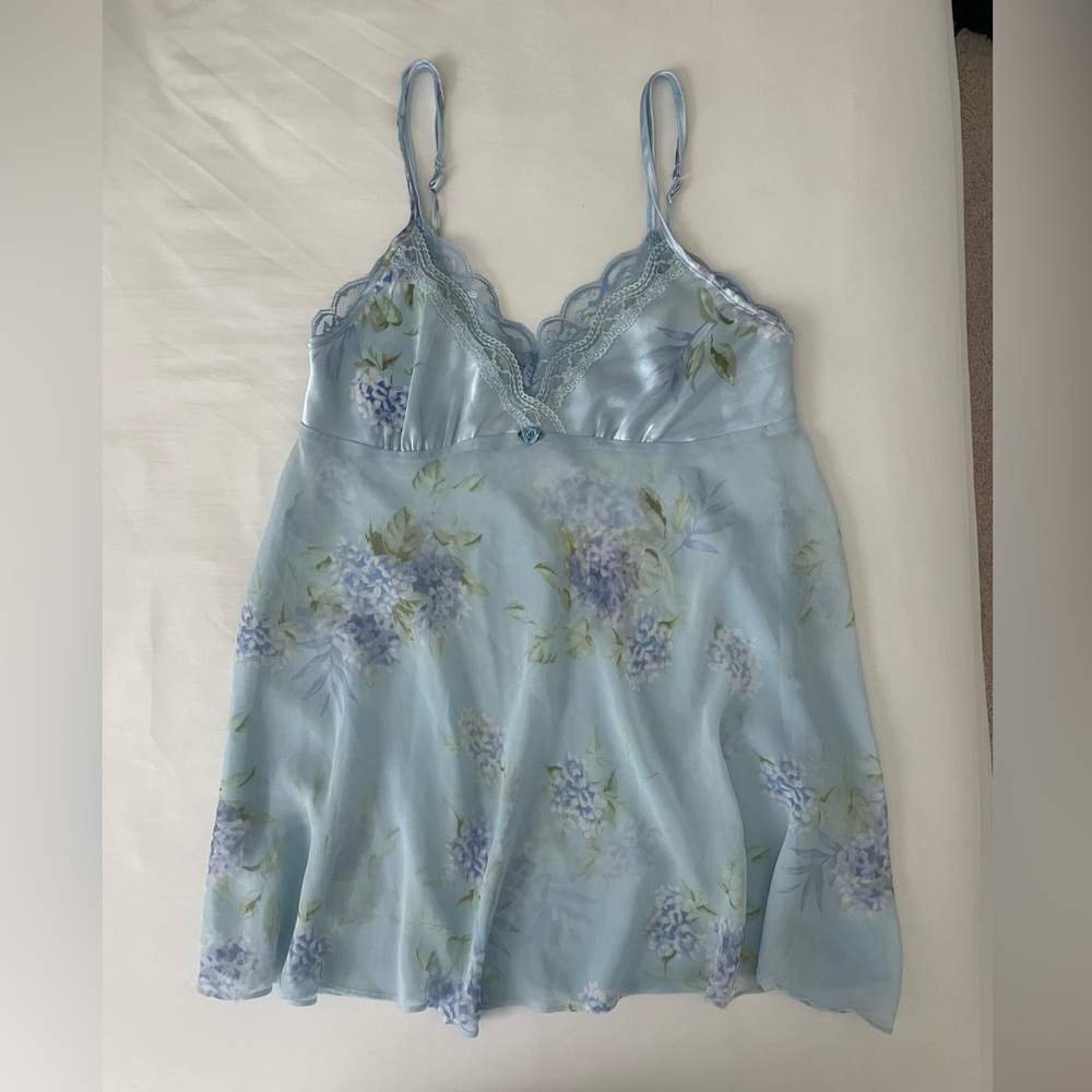 Vintage light blue lingerie slip dress. Blue, green, and white floral details.